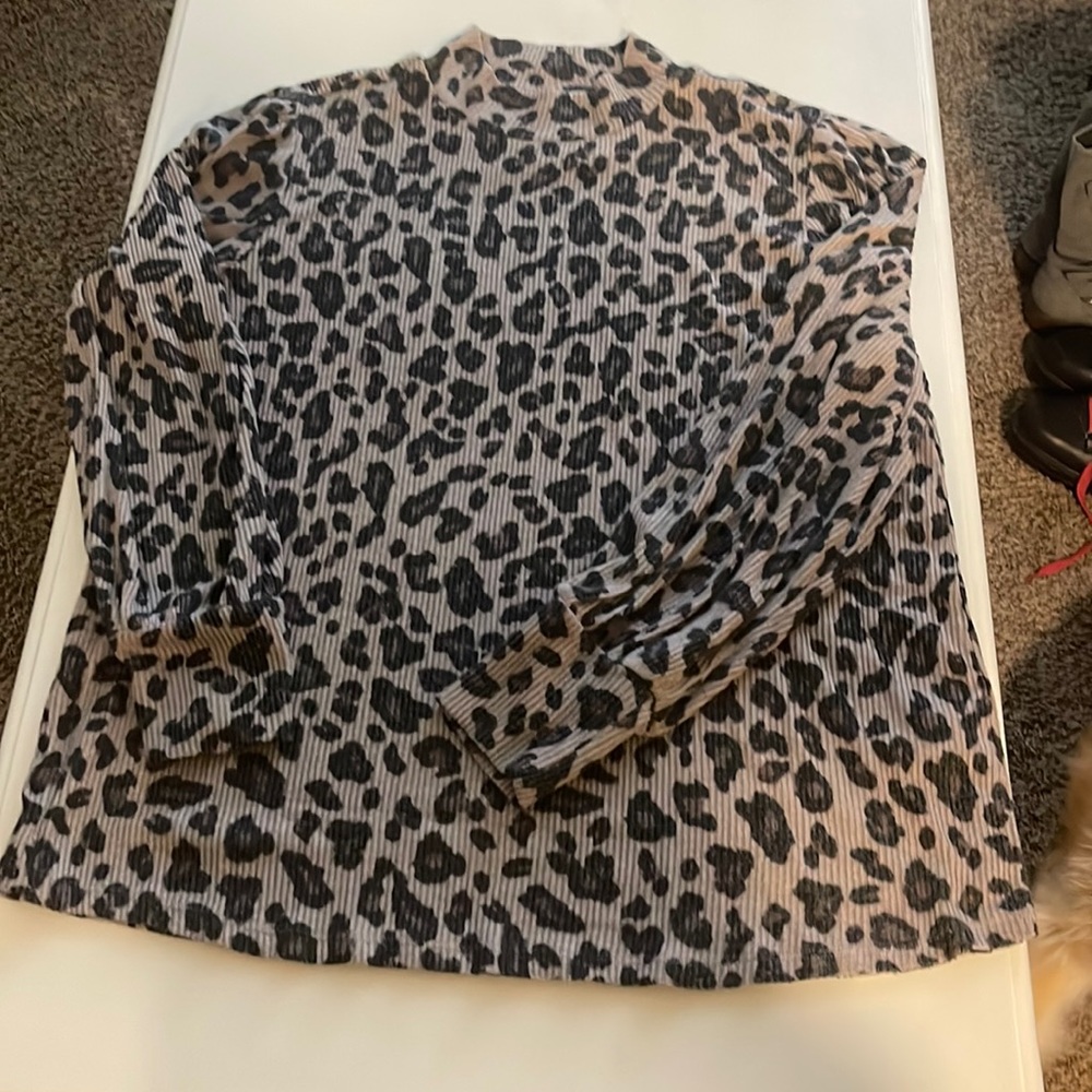 Maurice’s leopards print ribbed mock turtleneck top.